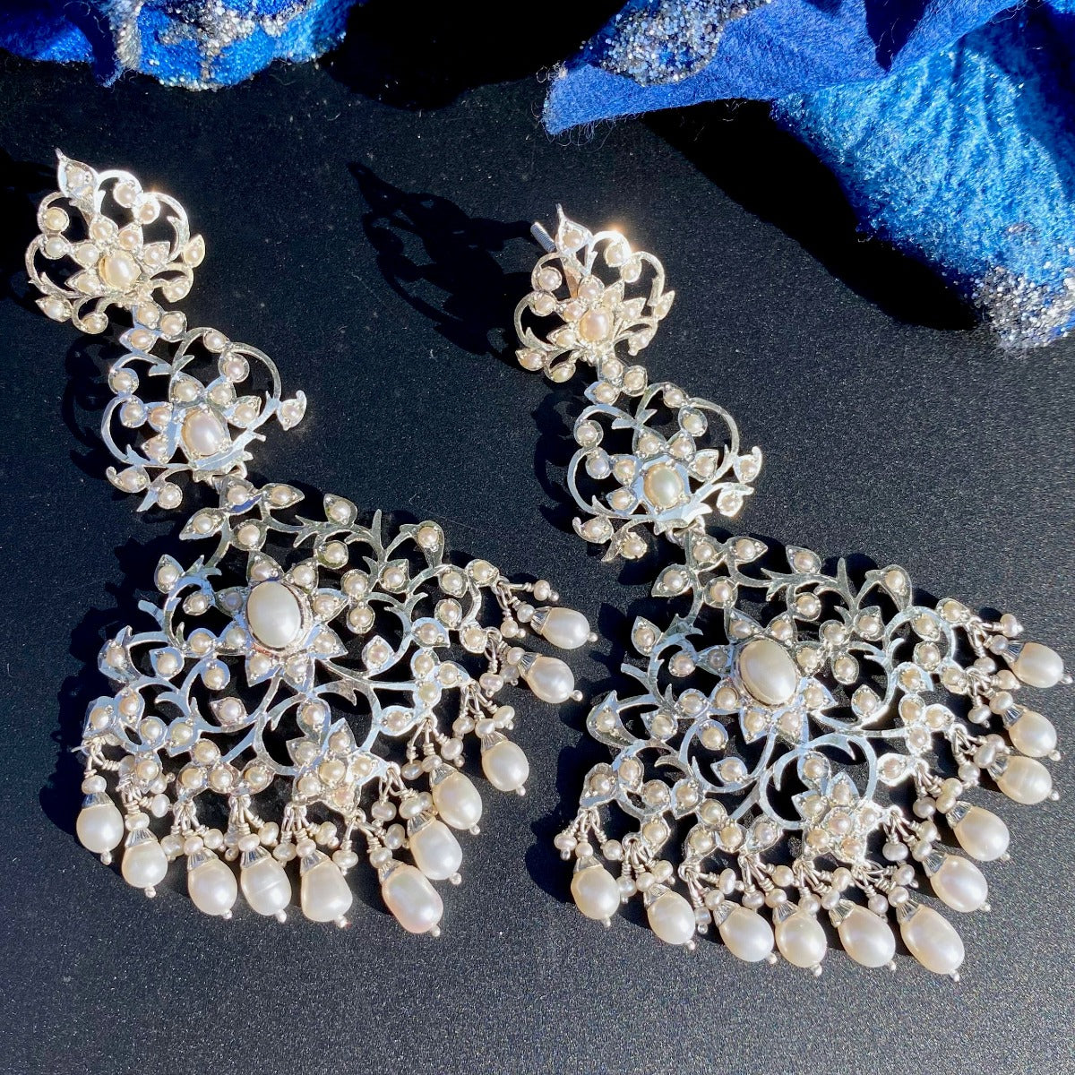 statement silver earrings with pearl drops
