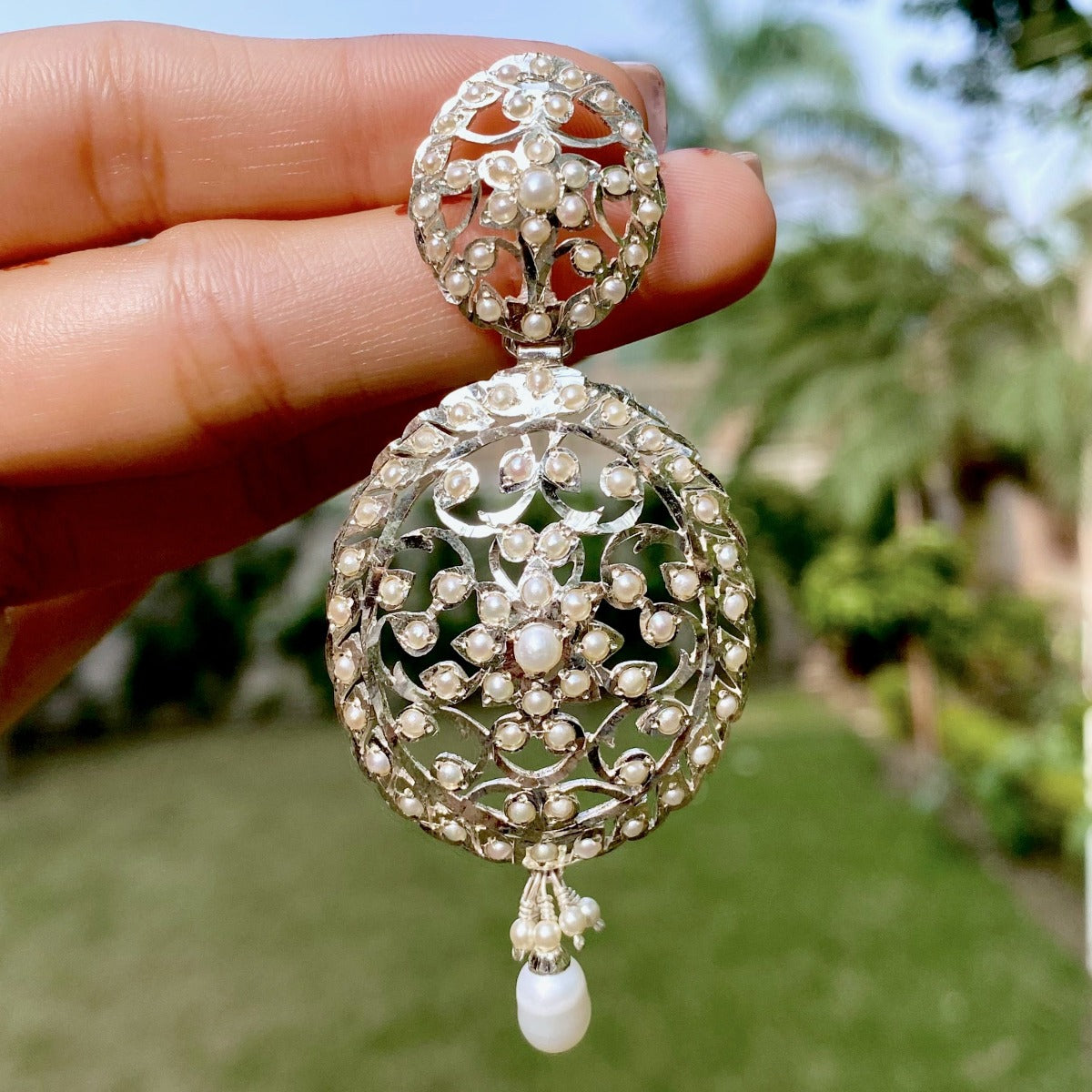 white silver earrings with pearls