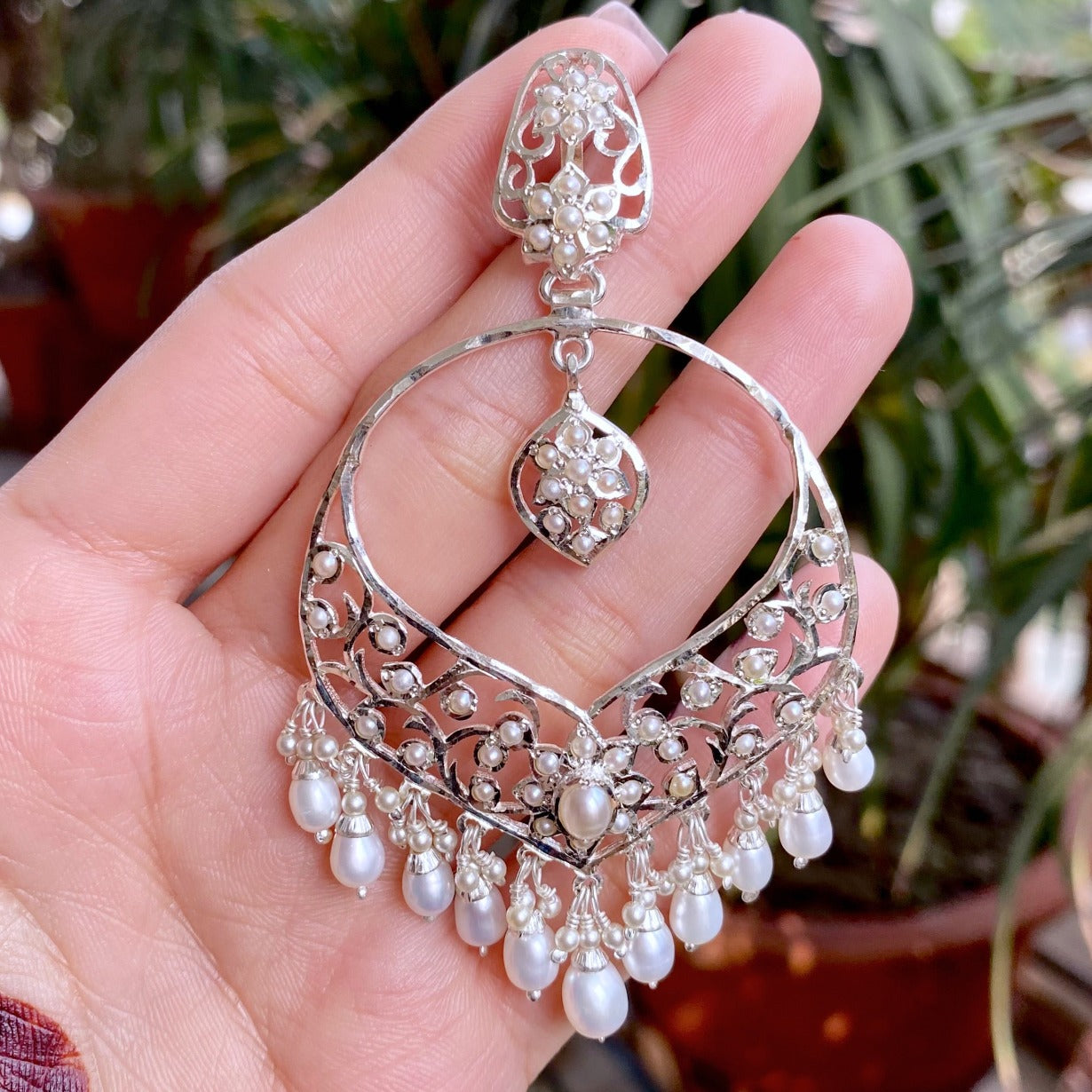 jadau earrings in white silver finish 