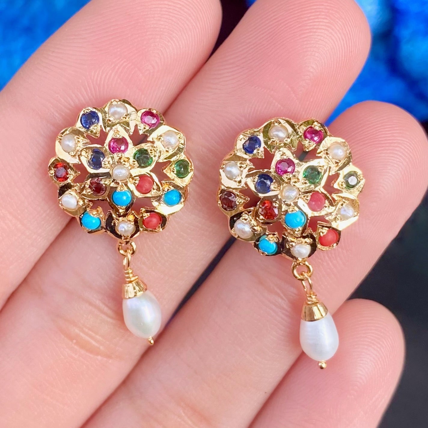delicate navaratna stud earrings