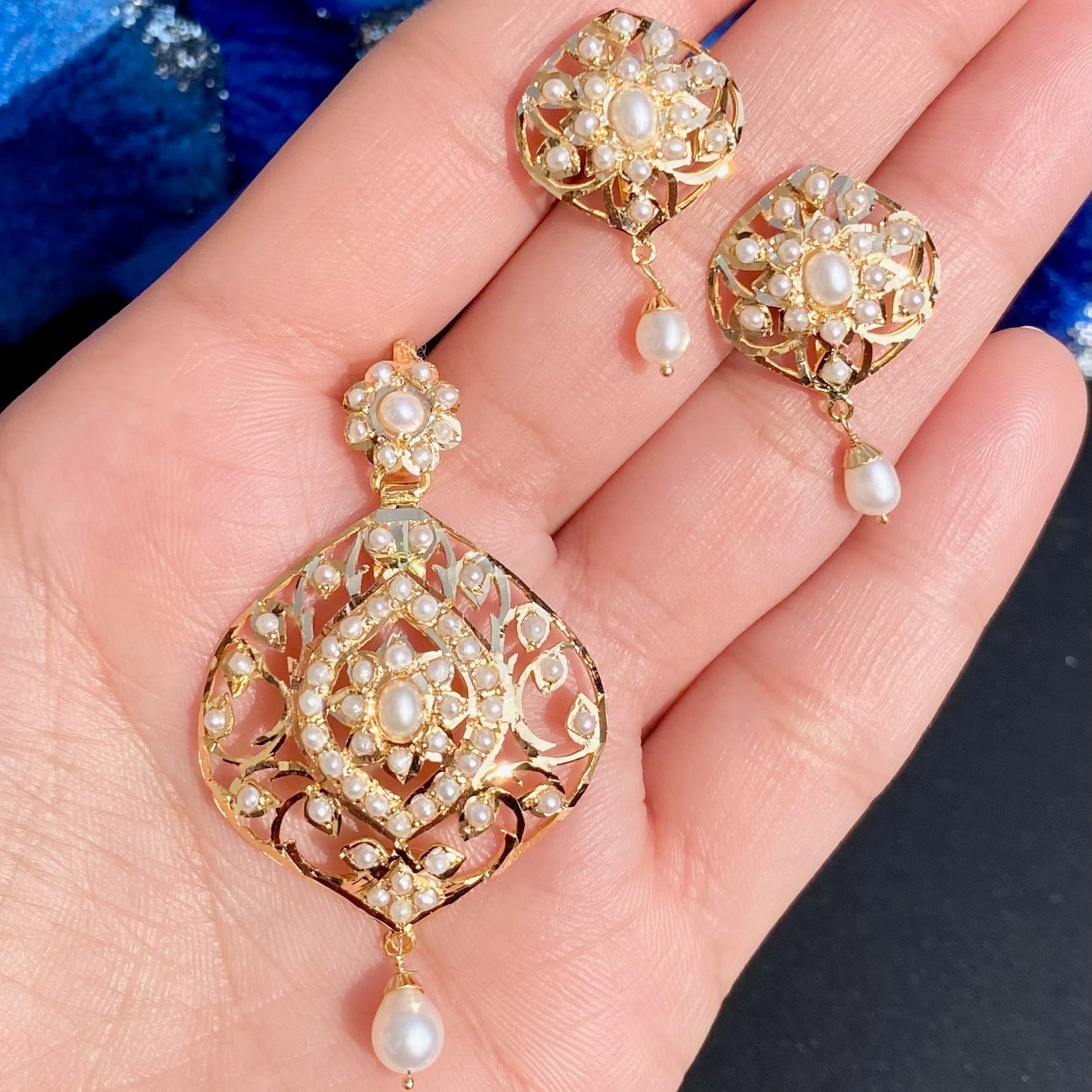 gold-pendant-set-with-pearls.jpg
