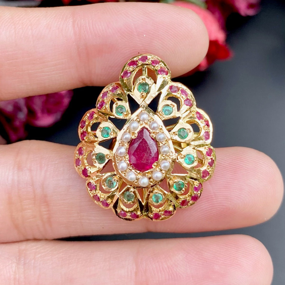 handmade gold ring studded with precious stones