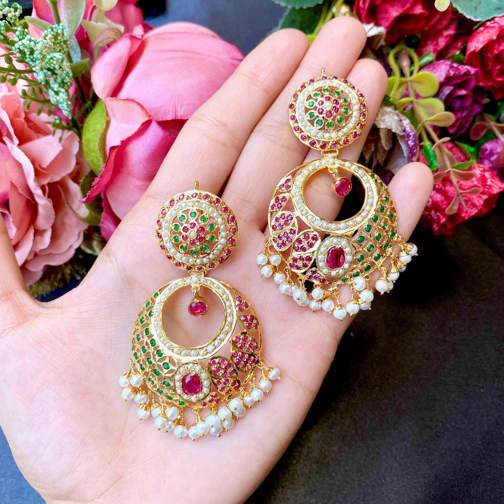 silver earrings looking like gold