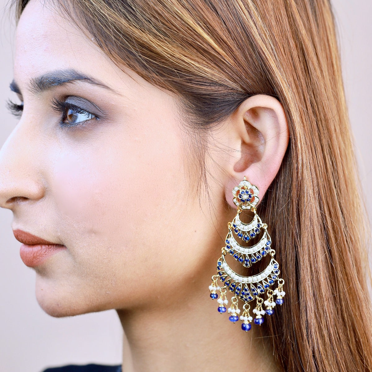 long neelam danglers in gold polished silver