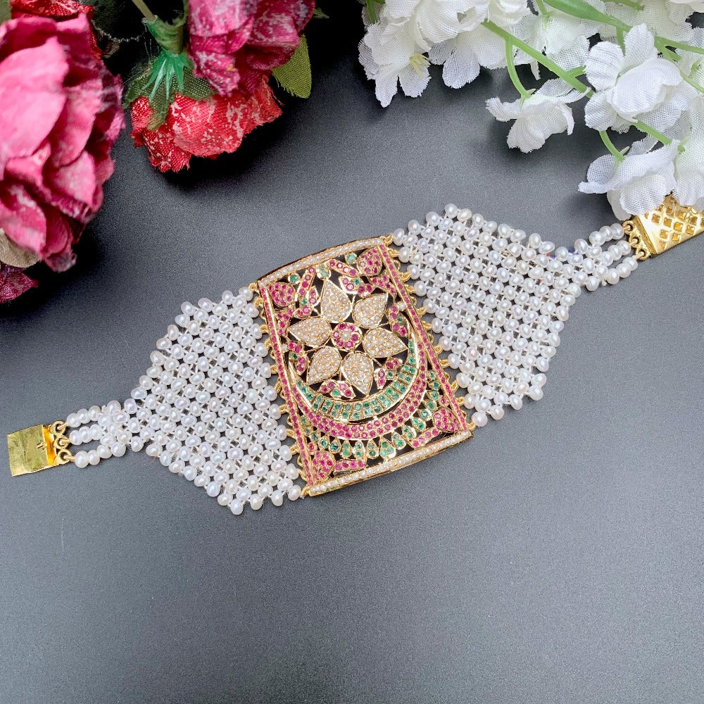 22k gold punjabi jadau bracelet studded with ruby emerald and pearls