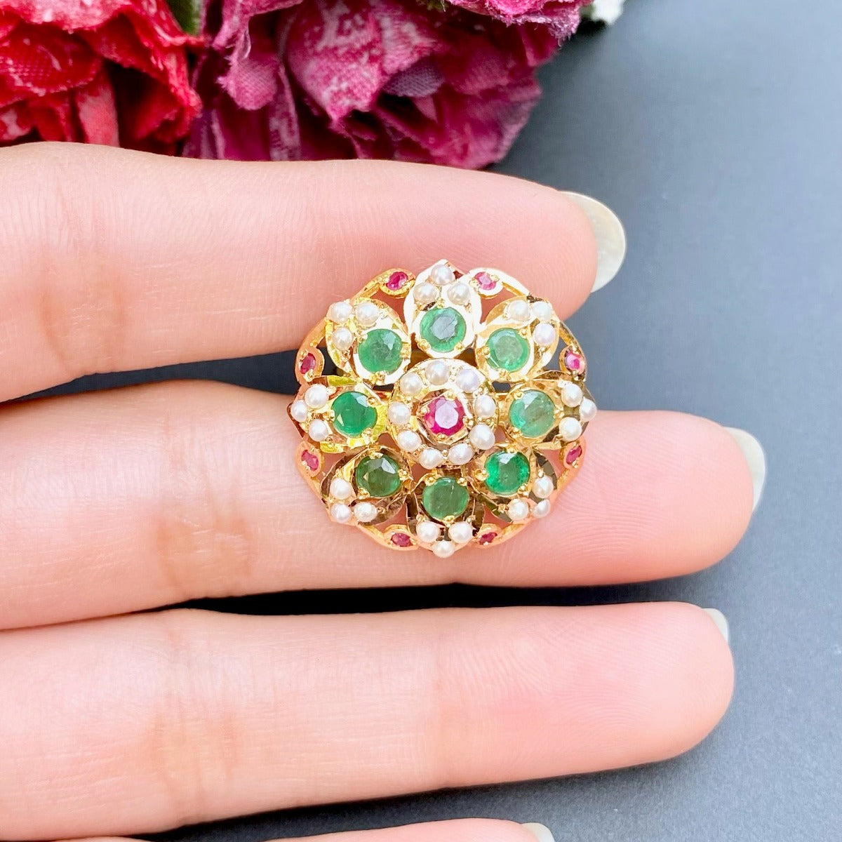 gold ring with emerald