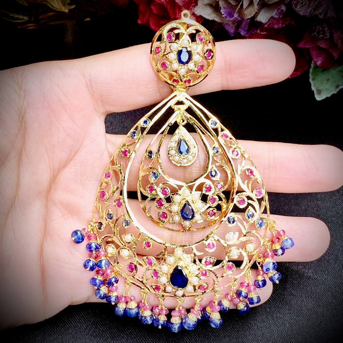 elegant gold chandbali studded with ruby and neelam