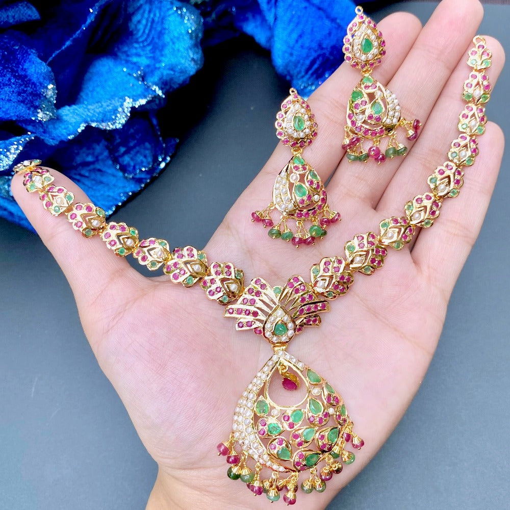 real 22 carat gold set with ruby emerald stones