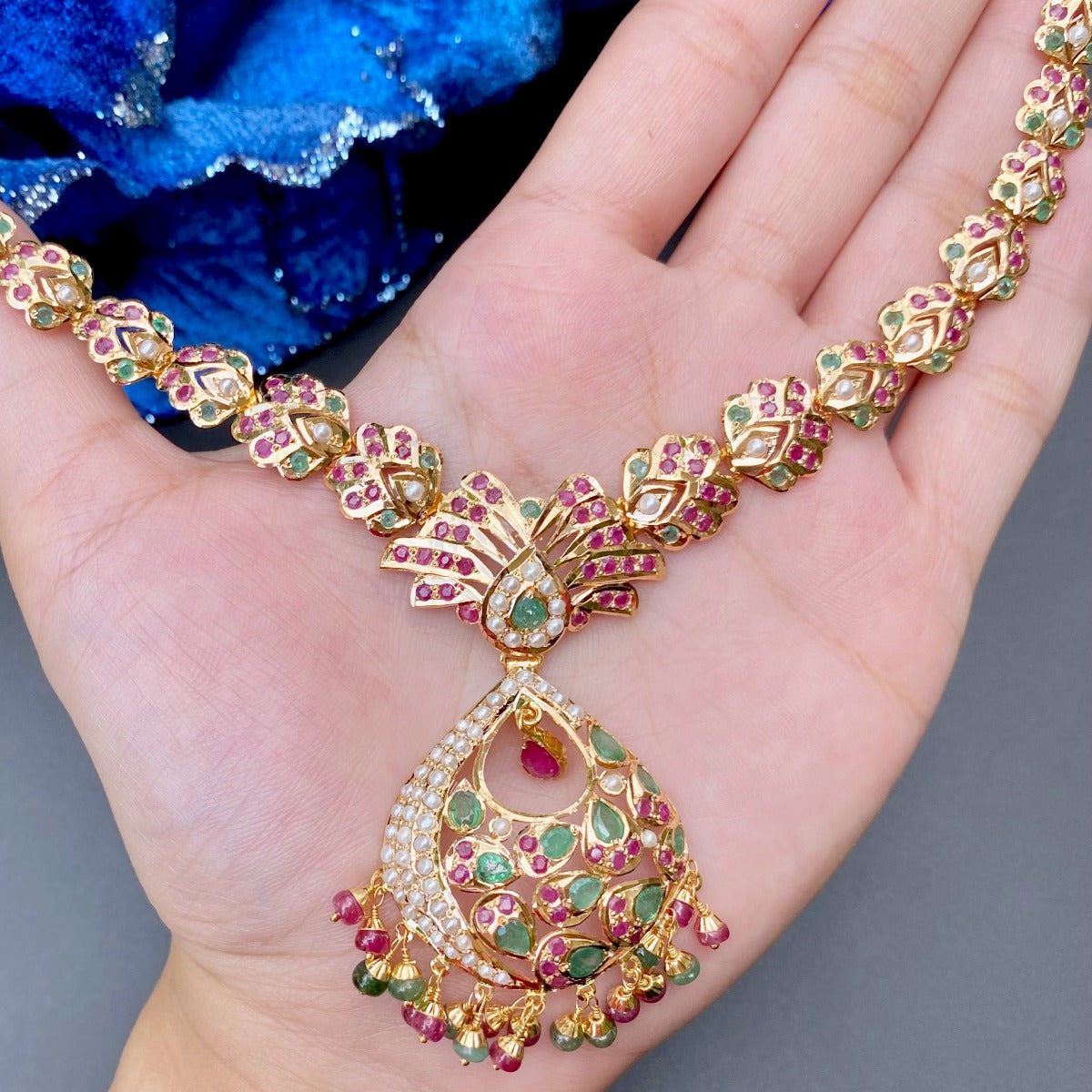 original jadau jewellery on 22 carat gold with real stones