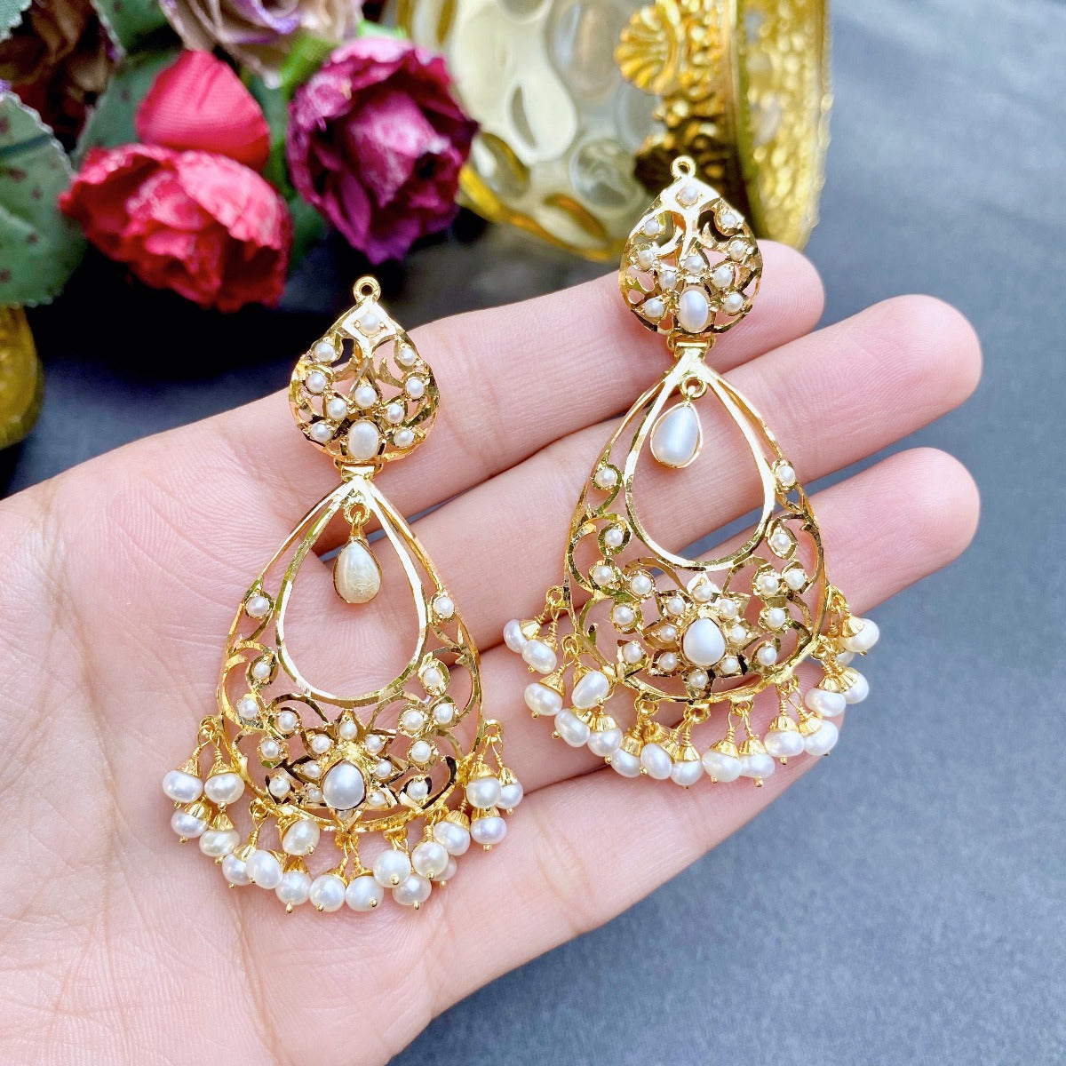 Get an amazing Raksha Antique Chandbali silver earrings