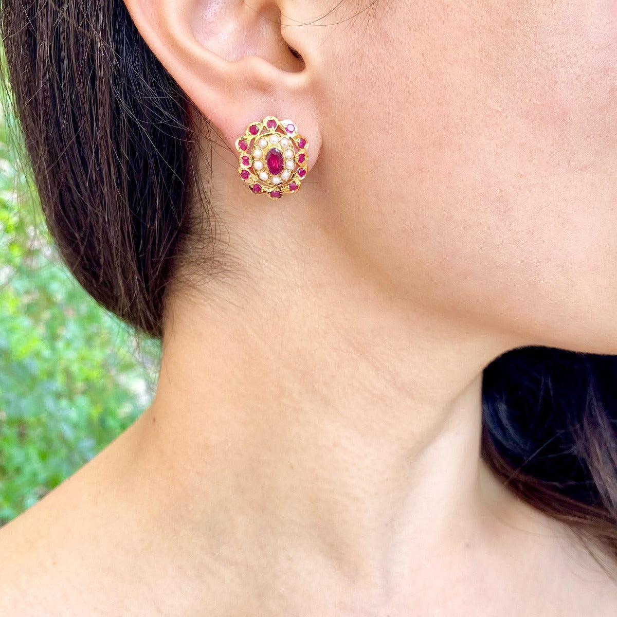 oval gold studs set with ruby and pearls