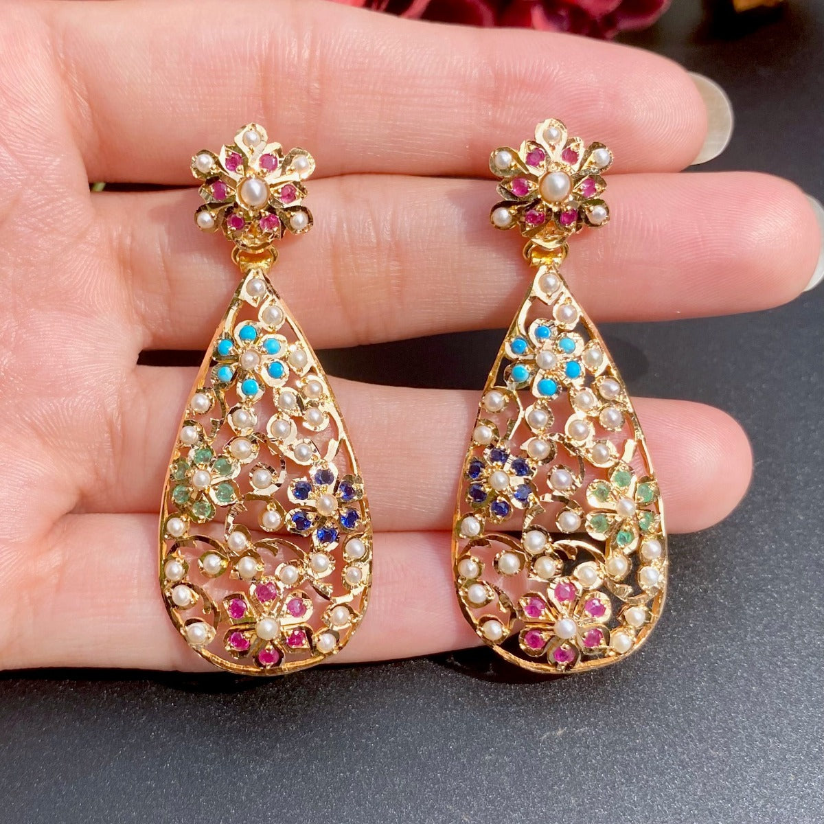22k gold earrings studded with navratna stones
