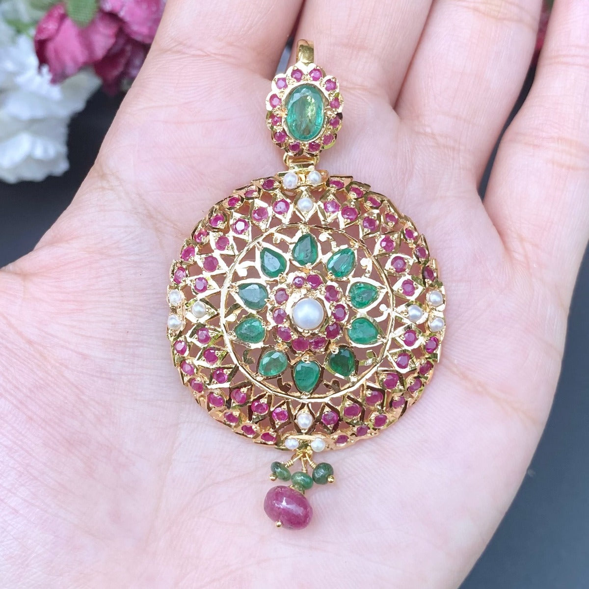jadau pendant with emeralds