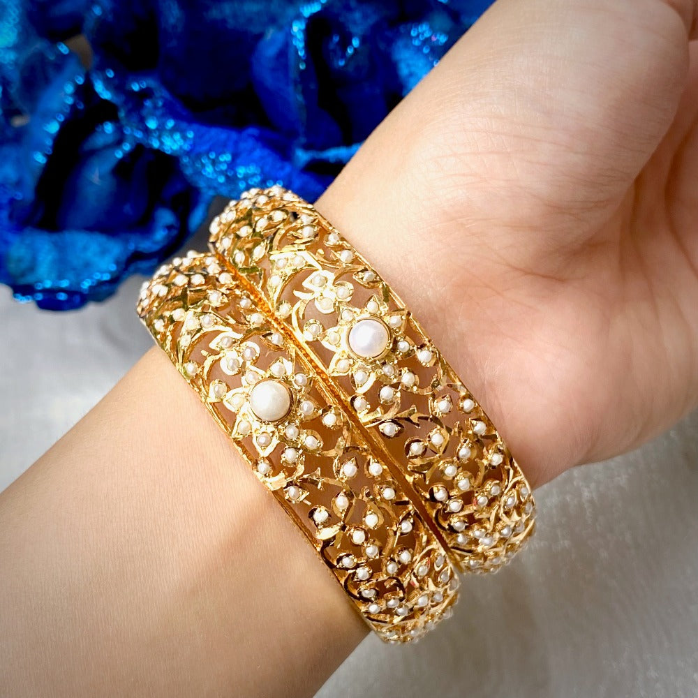 pearl bangles in gold plated silver metal
