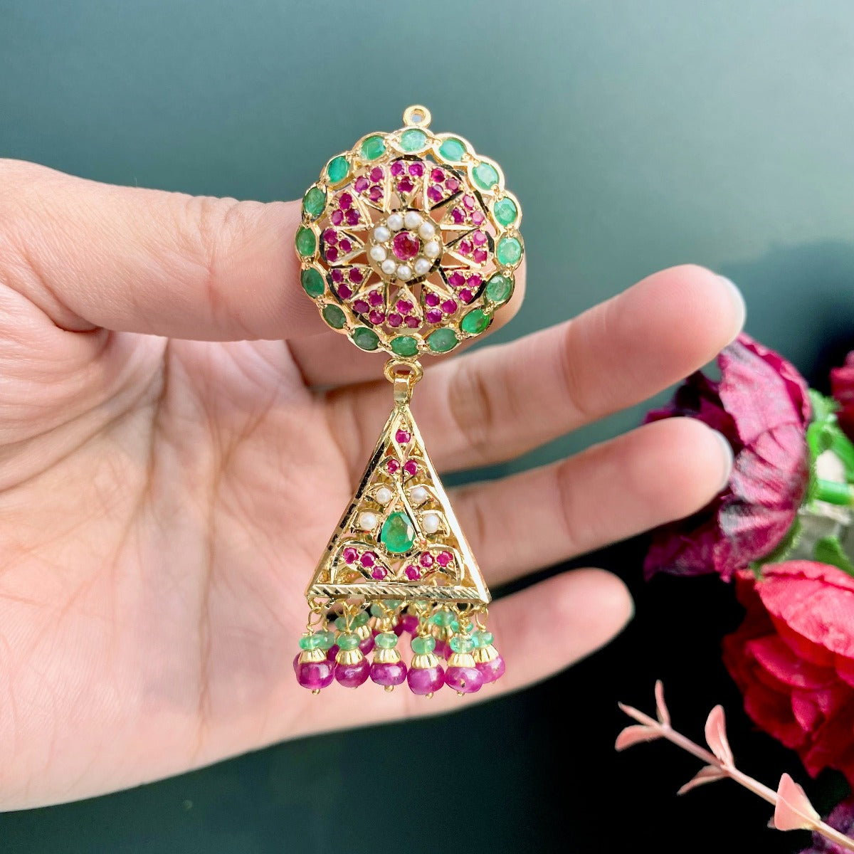 gold jhumka earrings for women made with jadau technique