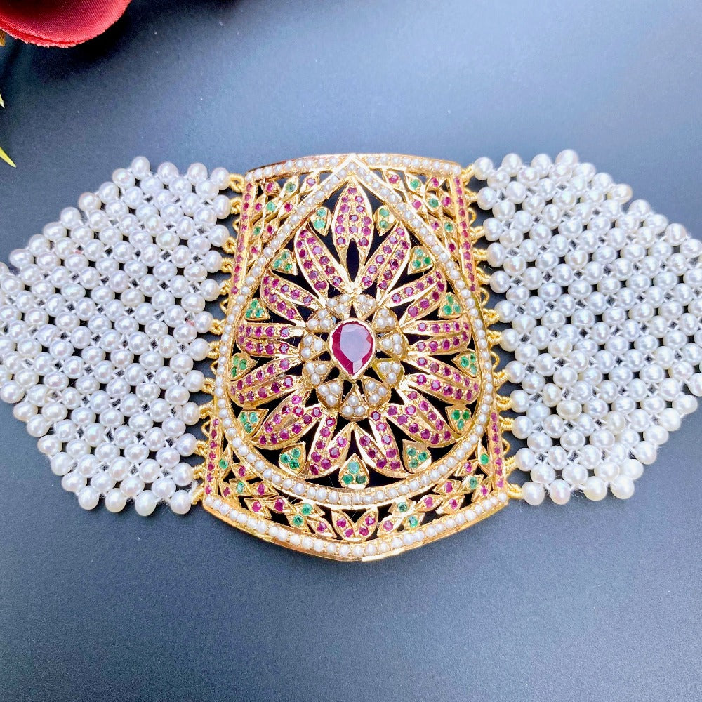 traditional mughal era indian bracelet studded with precious ruby emerald and pearls