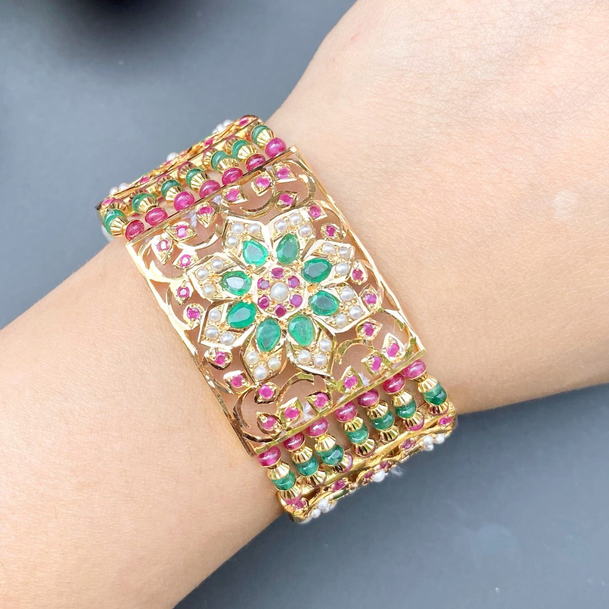 original gold bracelet studded with precious stones