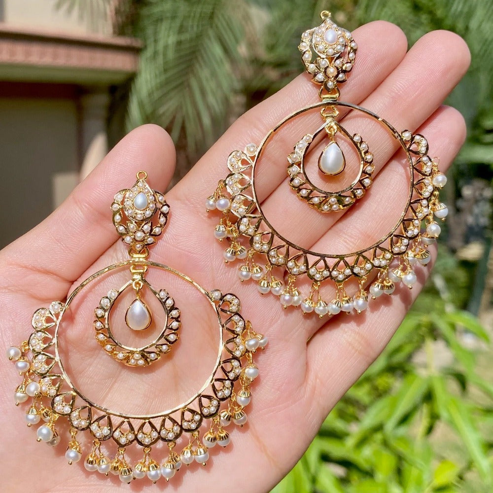gold chandbali earrings studded with pearls