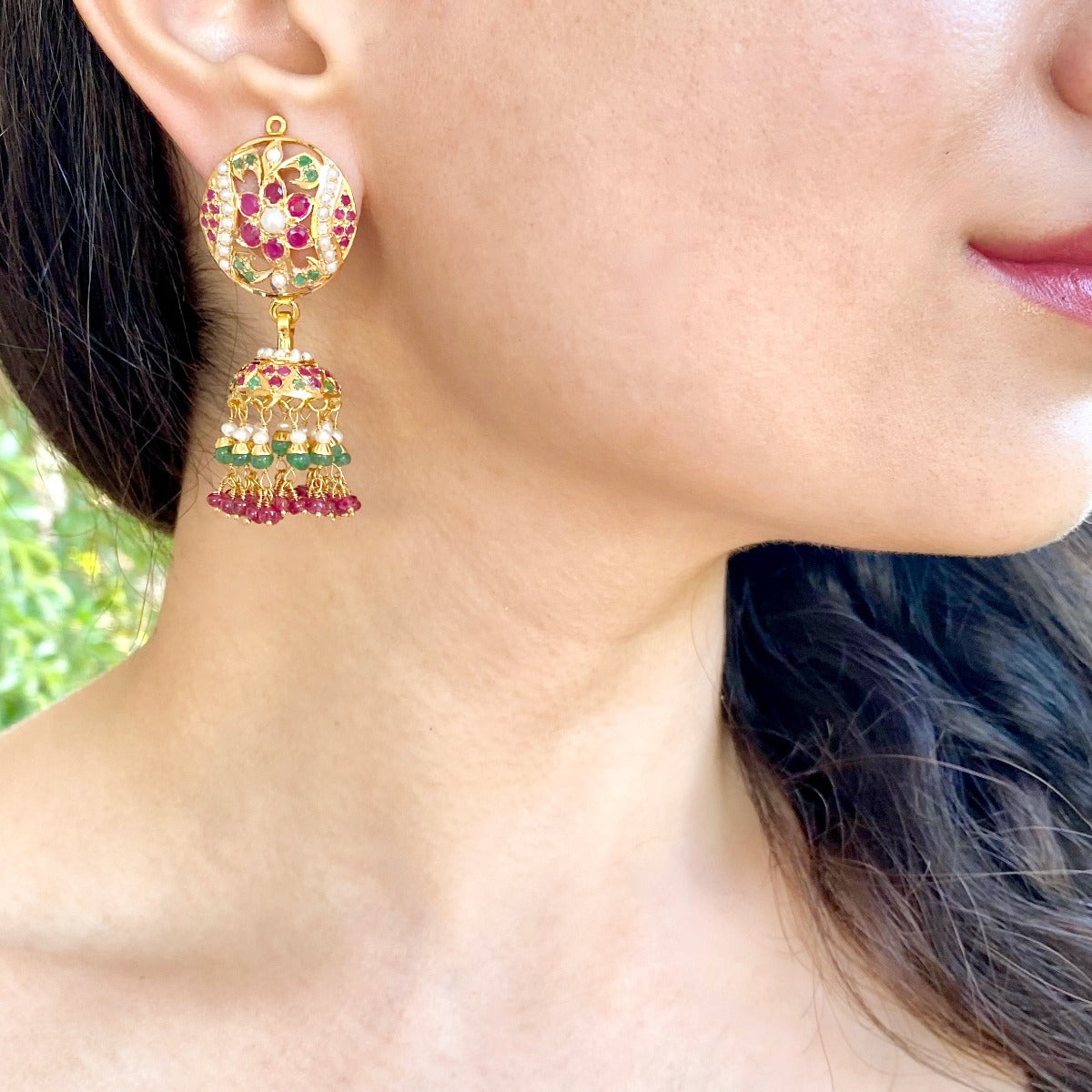 22 carat gold jhumka studded with ruby emerald and pearls 