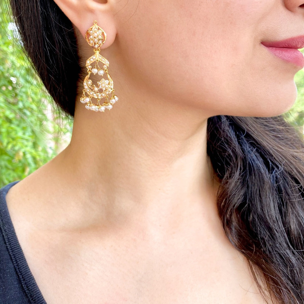 dainty pearl earrings in gold