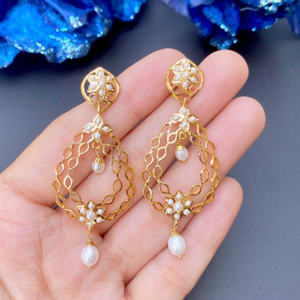 jadau earrings with jaali work in pearls