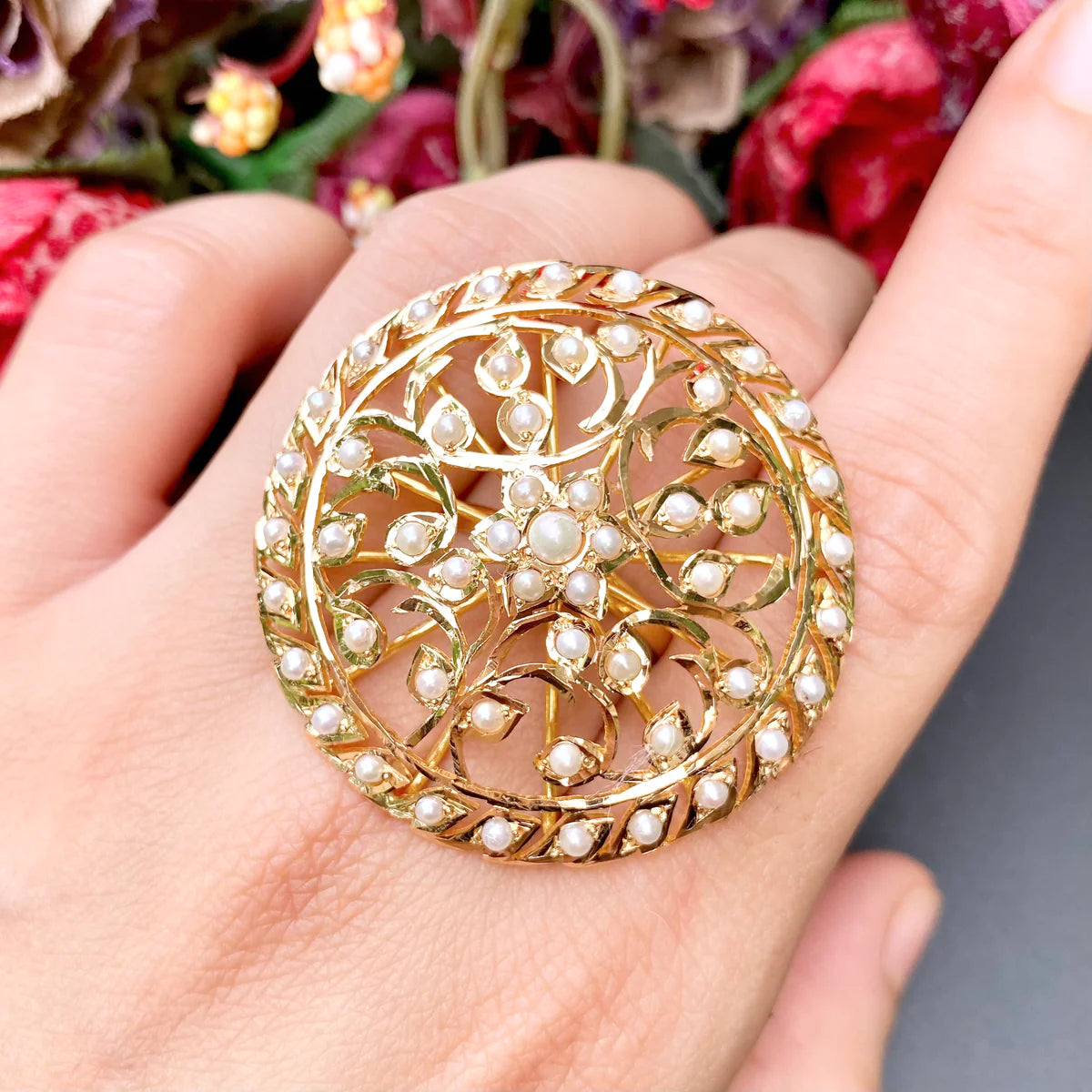 22k gold cocktail ring for ladies studded with pearls under 50000