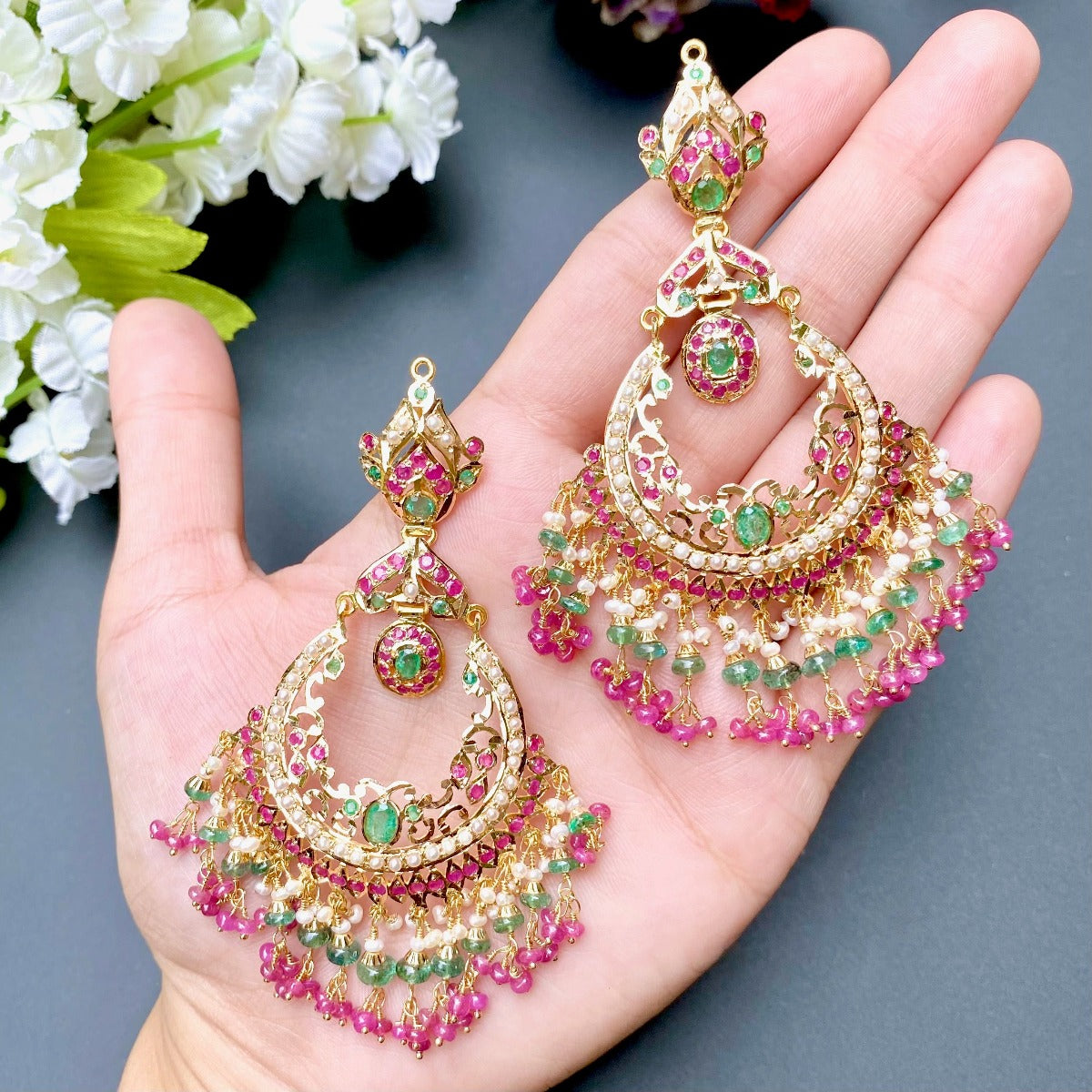 magnificient chandbali earrings in gold and ruby-emerald