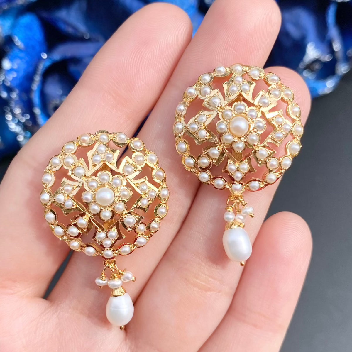 round pearl studs in gold plated silver